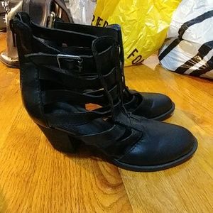 Black heeled strappy ankle booties